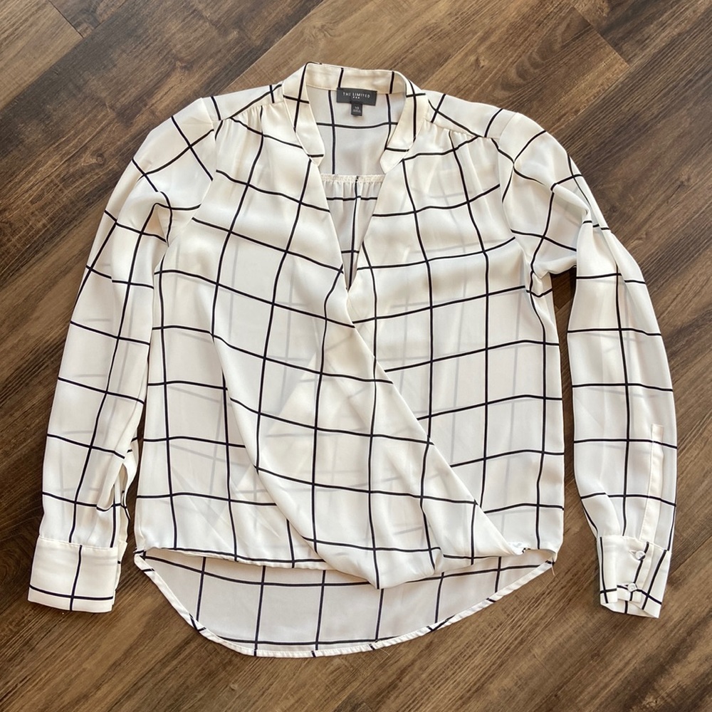 Black and white mock wrap style long sleeve blouse